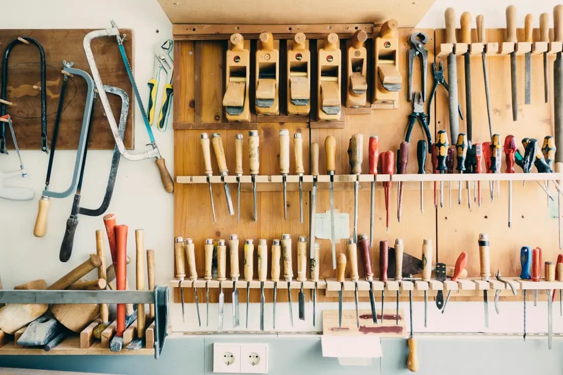 Tools and building materials on a hardware store wall