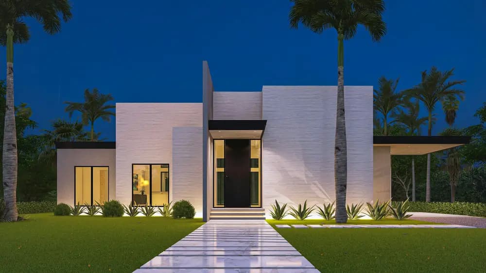 A completed single-storey house at dusk