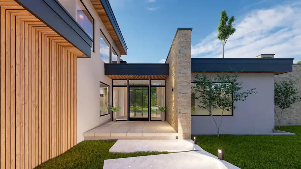 A completed house with a paved driveway